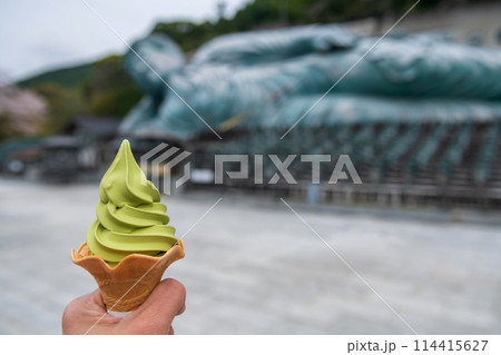 Green tea ice cream with blur reclining Buddha statue, Nanzoin Green tea ice cream with blur reclining Buddha statue, Nanzoin 114415627