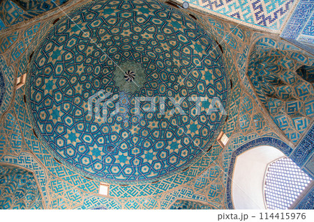Elaborate Islamic geometric patterns on the dome of the Jameh Mosque in Yazd. 114415976