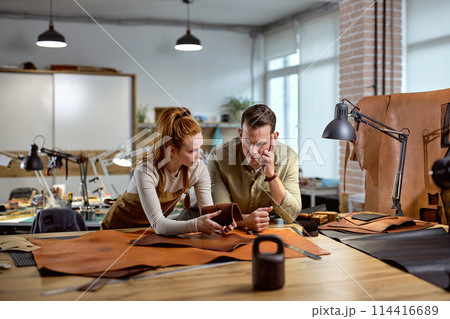 pensive craftsmen try to find out the type of leather pensive craftsmen try to find out the type of leather 114416689