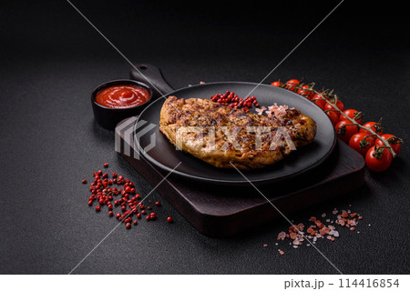 Delicious juicy pork steak with salt, spices and herbs 114416854