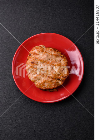 Delicious juicy turkey or chicken steak with salt, spices and herbs Delicious juicy turkey or chicken steak with salt, spices and herbs 114416907