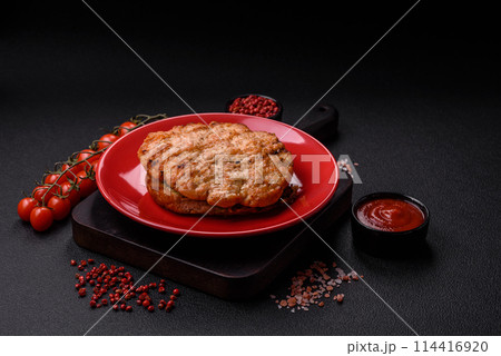 Delicious juicy turkey or chicken steak with salt, spices and herbs Delicious juicy turkey or chicken steak with salt, spices and herbs 114416920