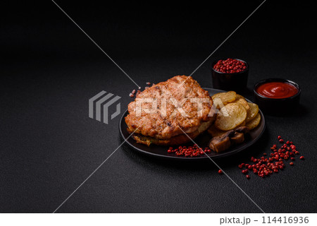 Delicious juicy turkey or chicken steak with salt, spices and herbs 114416936