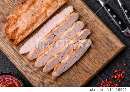 Delicious juicy turkey or chicken steak with salt, spices and herbs 114416965