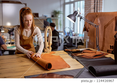 young pretty prepare natural material for work 114416967