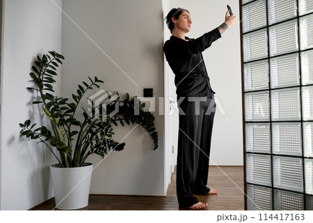 funny stylish man making phone call indoors 114417163