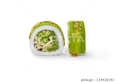 Vegetarian avocado sushi roll with vegetable filling on white Vegetarian avocado sushi roll with vegetable filling on white 114418143