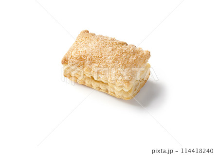 Crispy cream puff pastry sprinkled with sugar on white background 114418240