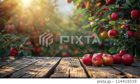 Wooden Table Covered With Red Apples 114419339