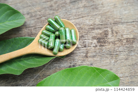 Green herbal capsules from herb for healthy eating in daily life 114424859