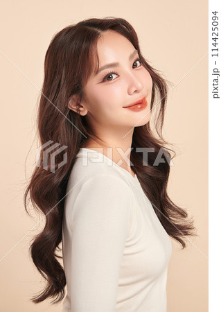 Beautiful young asian woman with clean fresh skin on beige background, Face care, Facial treatment, Cosmetology, beauty and spa, Asian women portrait. 114425094