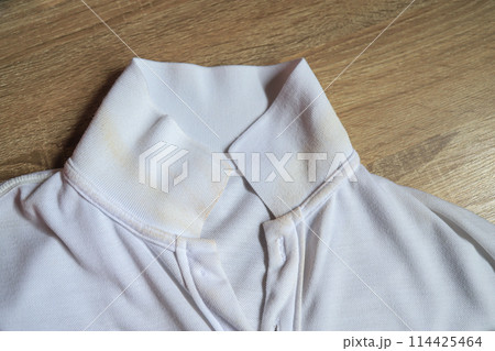 Dirty sweat stain on collar of shirt from long using in daily life. stain for cleaning concept. 114425464