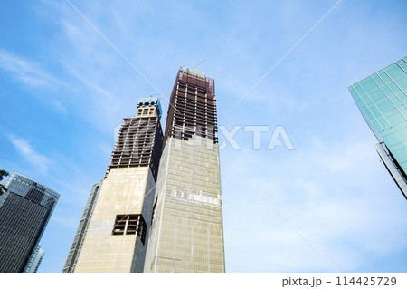 Skyscrapers and office building with blue sky Skyscrapers and office building with blue sky 114425729
