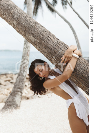 Luxury Relax of Beach Fashion Woman Model in White Modern Swimwear 114429264