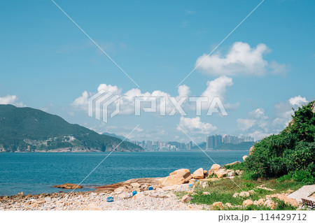 Shek O Tai Tau Chau beach and city view in Hong Kong 114429712