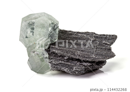 Macro stone Fluorite mineral on white background Macro stone Fluorite mineral on white background 114432268