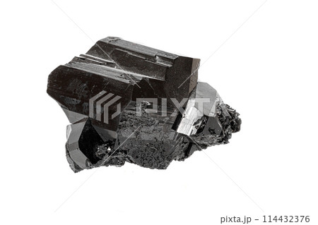 Macro stone black mineral tourmaline Scherl on white background 114432376
