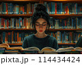 Diligent Student Immersed in Study at the Library 114434424