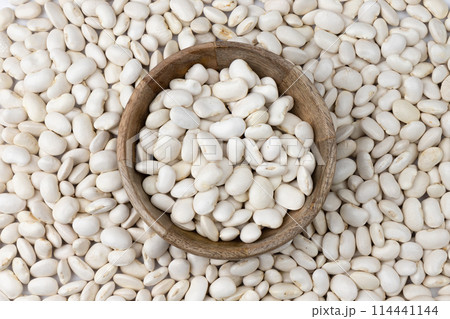 background of white kidney beans close up, top view background of white kidney beans close up, top view 114441144