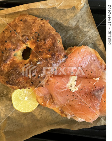 Smoked salmon with cottage bagle for breakfast. Smoked salmon with cottage bagle for breakfast. 114442452