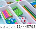 School supplies.Concept back to school. colored stationery is arranged in white organizers. Creative Drawer Organizing. Storage office supplies 114445798