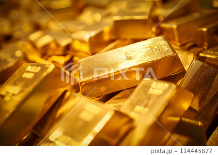 Banking finance concept background - pile of gold bars bullions ingots close up 114445877