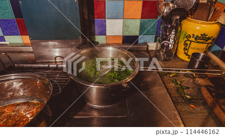 Saucepans in the kitchen 114446162