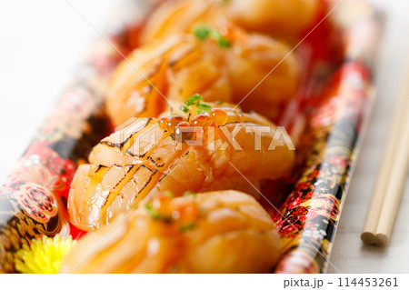 Scallop hotate sushi, closeup. Scallop hotate sushi, closeup. 114453261
