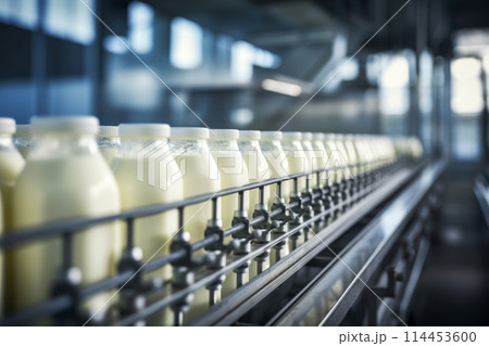 Automated dairy product production line with bottles on conveyor belt in factory 114453600