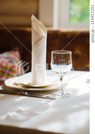 Table setting before the banquet. Table setting before the banquet. 114457201