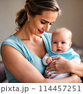 Gentle cute mom with baby.  114457251