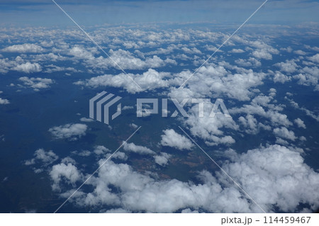 View from an airplane window to see the sky and white cloud View from an airplane window to see the sky and white cloud 114459467