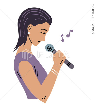 A young woman sings into a microphone 114460387