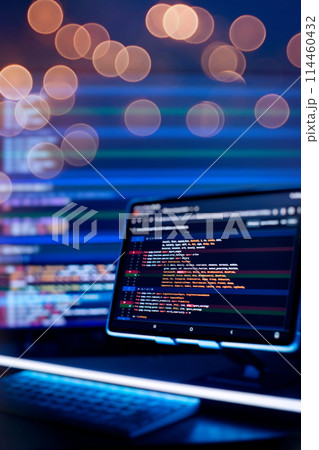 Work from home. Programmer coding code on notebook screen at home. 114460432