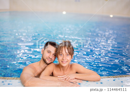 smiling two people looking at the camera 114464511