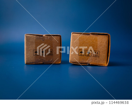 Closeup miniature mini express blind box on a blue background 114469638