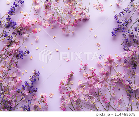 Lilac flowers on grunge background. Flat lay, top view 114469679
