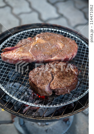 Meat on the charcoal grill 114471062