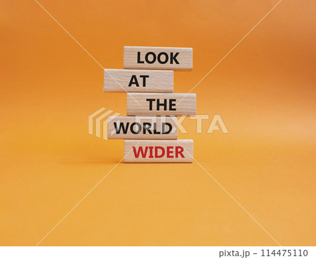 Look at the world wider symbol. Wooden blocks with words Look at the world wider. Beautiful orange background. Business and Look at the world wider concept. Copy space. Look at the world wider symbol. Wooden blocks with words Look at the world wider. Beautiful orange background. Business and Look at the world wider concept. Copy space. 114475110