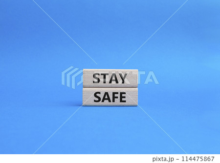 Stay Safe symbol. Concept word Stay Safe on wooden blocks. Beautiful blue background. Business and Stay Safe concept. Copy space Stay Safe symbol. Concept word Stay Safe on wooden blocks. Beautiful blue background. Business and Stay Safe concept. Copy space 114475867