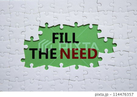 Fill the need symbol. Concept word Fill the need on white puzzle. Beautiful green background. Business and Fill the need concept. Copy space 114476357
