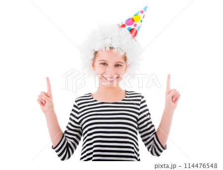 Beautiful teenage girl in snowy white color wig points up showing something isolated on white background 114476548