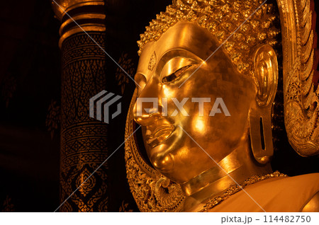 Beautiful golden Buddha situated in Wat Phra Sri Rattana Mahathat temple in Phitsanulok province of Thailand. 114482750