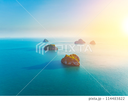 aerial drone view of a beautiful tropical island. Small tropical island in the ocean. Top travel tourist destination, best diving snorkeling. aerial drone view of a beautiful tropical island. Small tropical island in the ocean. Top travel tourist destination, best diving snorkeling. 114483822