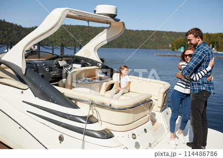 Couple on Yacht. vacation on Boat man and woman. Sailing Sea Couple on Yacht. vacation on Boat man and woman. Sailing Sea 114486786