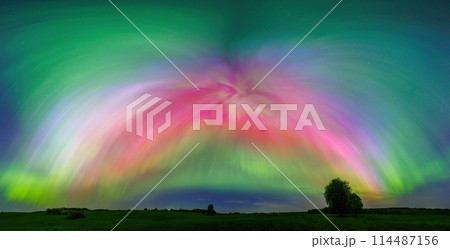 Aurora borealis is a natural light show in the sky resembling a rainbow 114487156