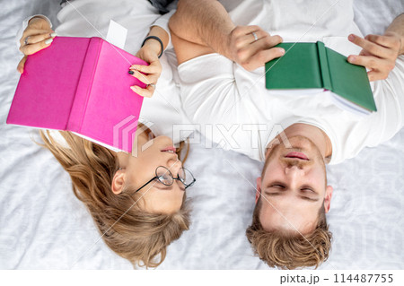 reading young family. before the sleep. reading habit 114487755