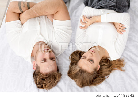 pensive serious couple trying to solve problems pensive serious couple trying to solve problems 114488542
