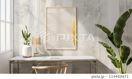 Empty picture frame mockup. A vertical wall art poster hanging on a wall above a desk. Empty picture frame mockup. A vertical wall art poster hanging on a wall above a desk. 114489871