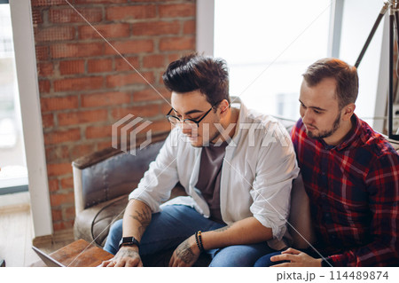 Homosexual partners working at office desk, relationships and business concept 114489874